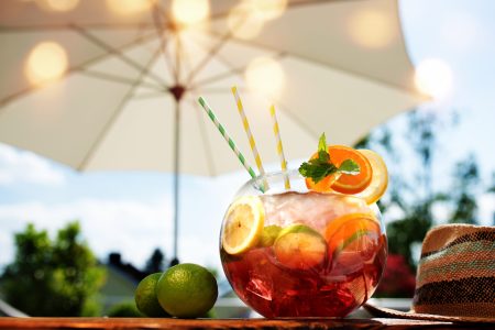 Red,Sangria,Cocktail,On,A,Summer,Terrace,With,A,Parasol